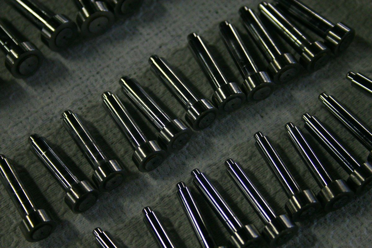 Rows of precision ground steel shafts and pins